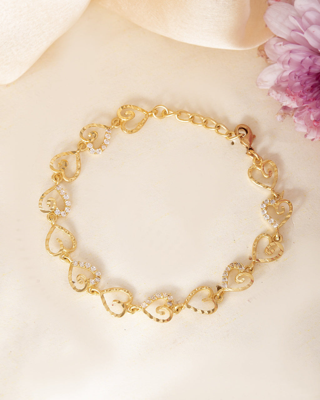 VOJ Gold-Polished Heart Shapped AD Stone Studded Women's Bracelet - Distacart