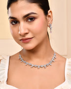 VOJ Silver Toned White And Baby Pink Stone Studded AD Jewellery Set