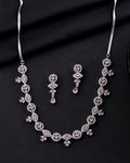 VOJ Silver Toned White And Baby Pink Stone Studded AD Jewellery Set