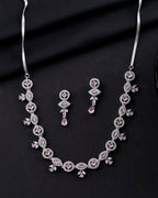 VOJ Silver Toned White And Baby Pink Stone Studded AD Jewellery Set
