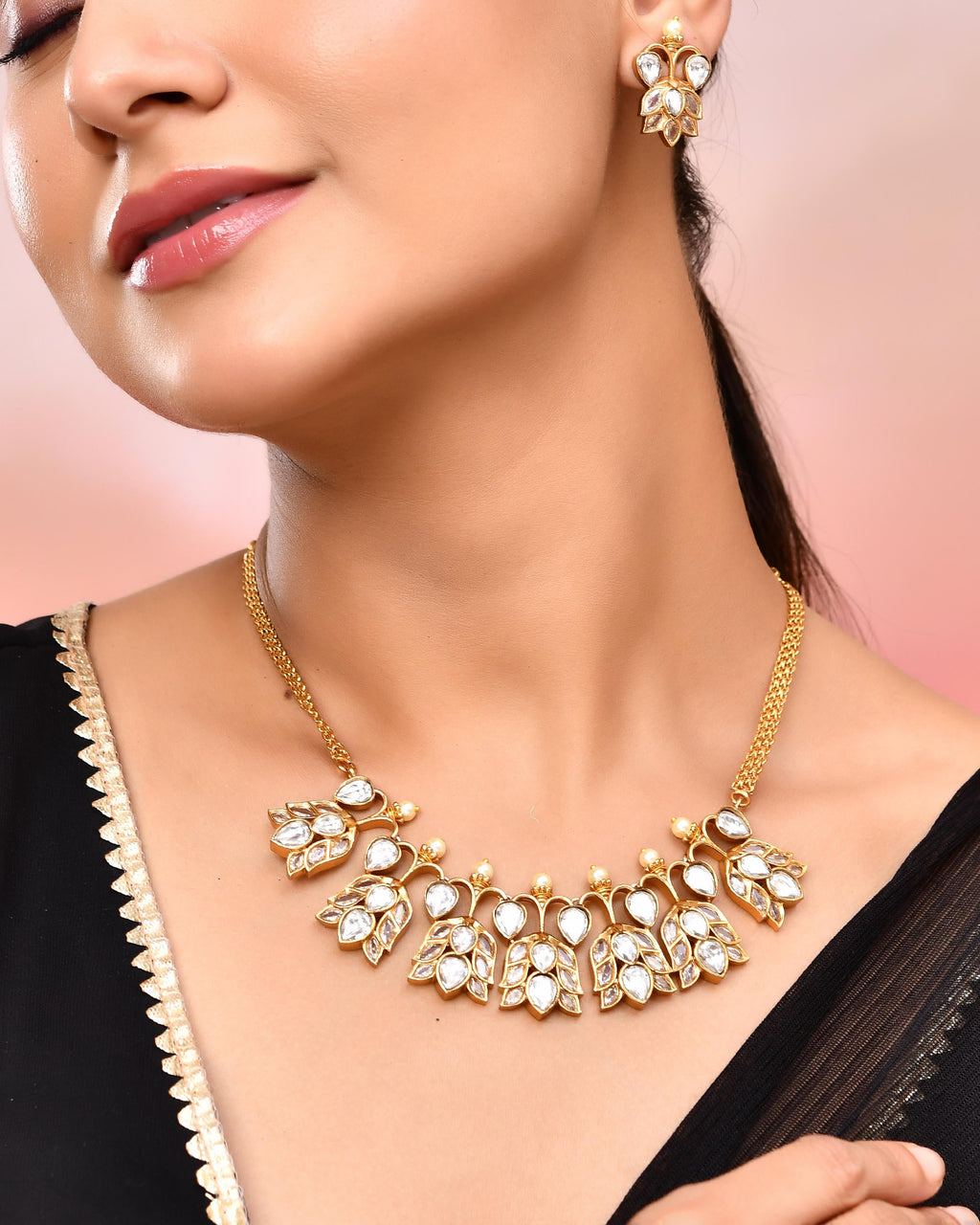 VOJ Gold-Polished Floral Shaped Stone Studded Designer Jewellery Set