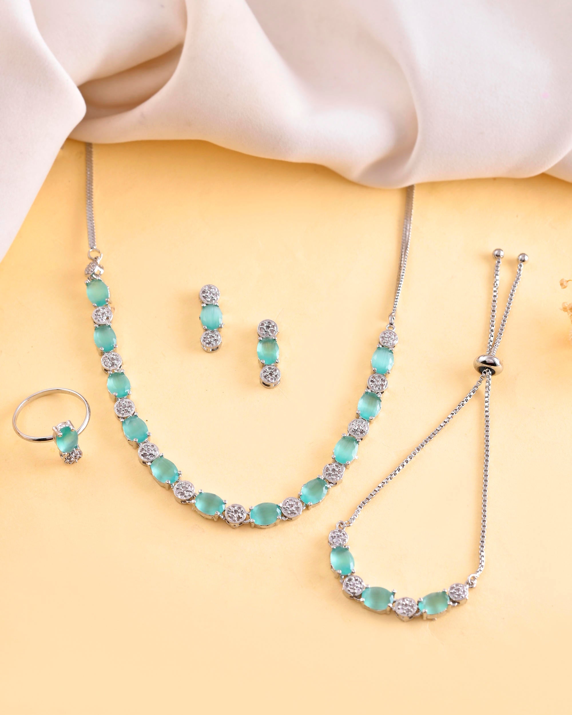 VOJ Silver Plated Teal Stone Studded Necklace Set With Ring And bracelet