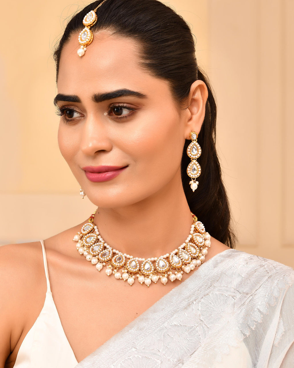 VOJ Gold-Polished Kundan Stones Studded Jewellery Set With Maang Tikka