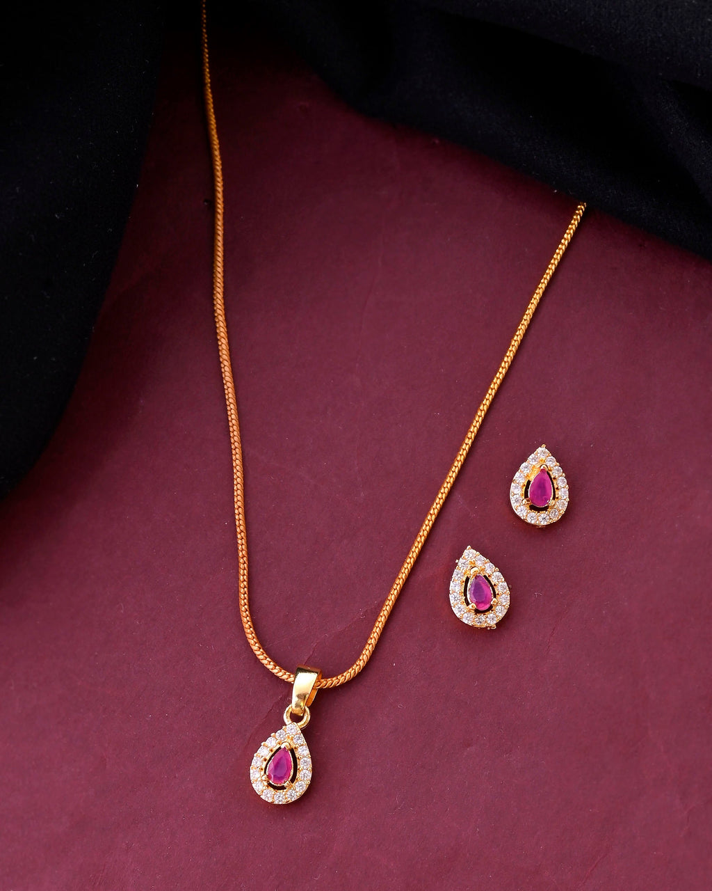 VOJ Gold-Polished Tear Drop Shaped Ruby Red Stone Studded Chain Set