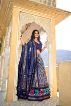 Vastranavya Designer Ikkat Print With Foil Work Lehenga Choli - Navy Blue