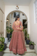 Eilara Glamorous Rust Butterfly Net With Tone To Tone Thread And Sequence Embroidered Work Lehenga Choli For Wedding