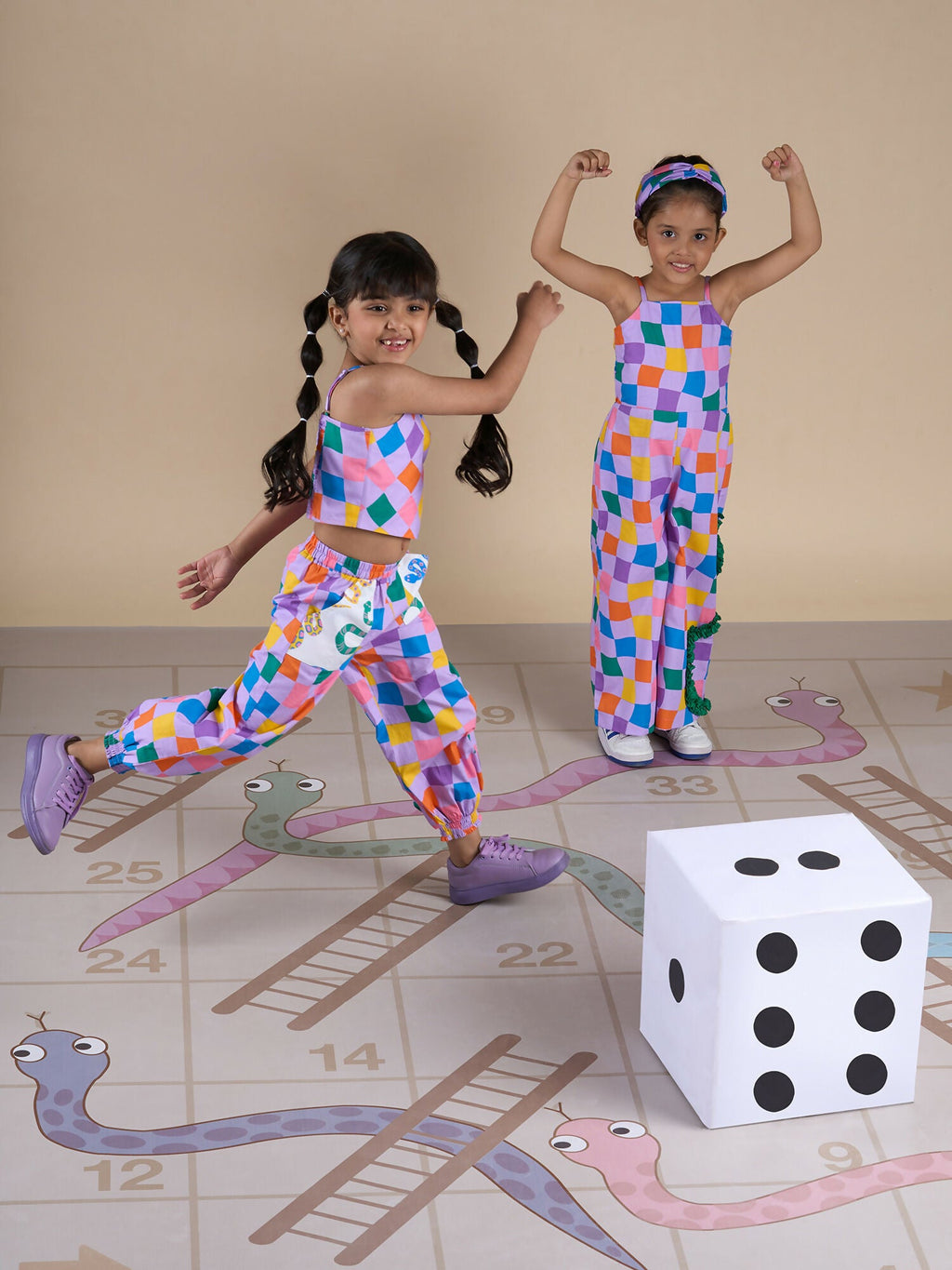 Snakes and Ladders Girls Multi Color Rotary Print Jumpsuit from Siblings Collection