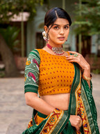 Vastranavya Patola Printed and Foil Work Tussar Silk Lehenga with Unstitched Blouse - Mustard