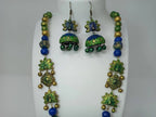 Terracotta Long Haram Set-Beautiful Dazzling Peacock Pendent With Ear Hanging Jhumkas