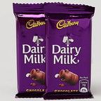 Ethnic Om Metal Rakhi & Dairy Milk Chocolates - Distacart