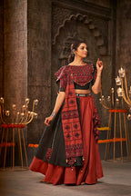 Orange Cotton Thread Embroidered Navratri Lehenga Choli with Dupatta - Raas