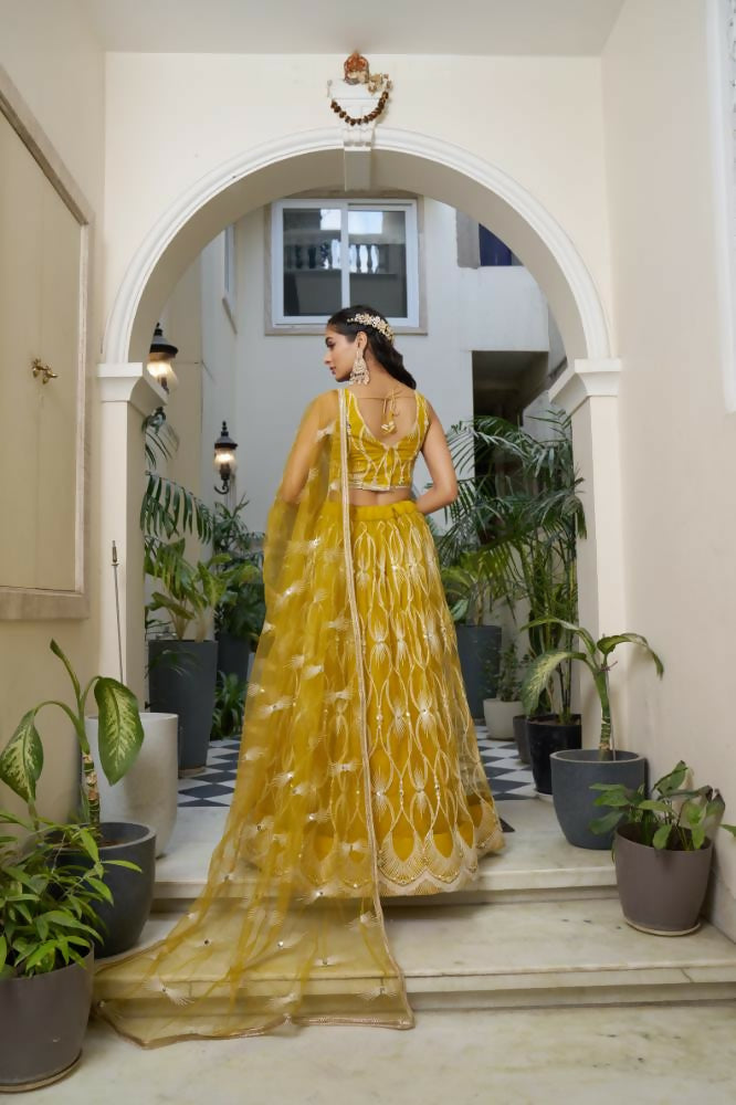 Aastha Fashion Mustard Yellow Butterfly Net White Cotton Thread Work And Sequence Work Embroidery Wedding Wear Lehenga Choli