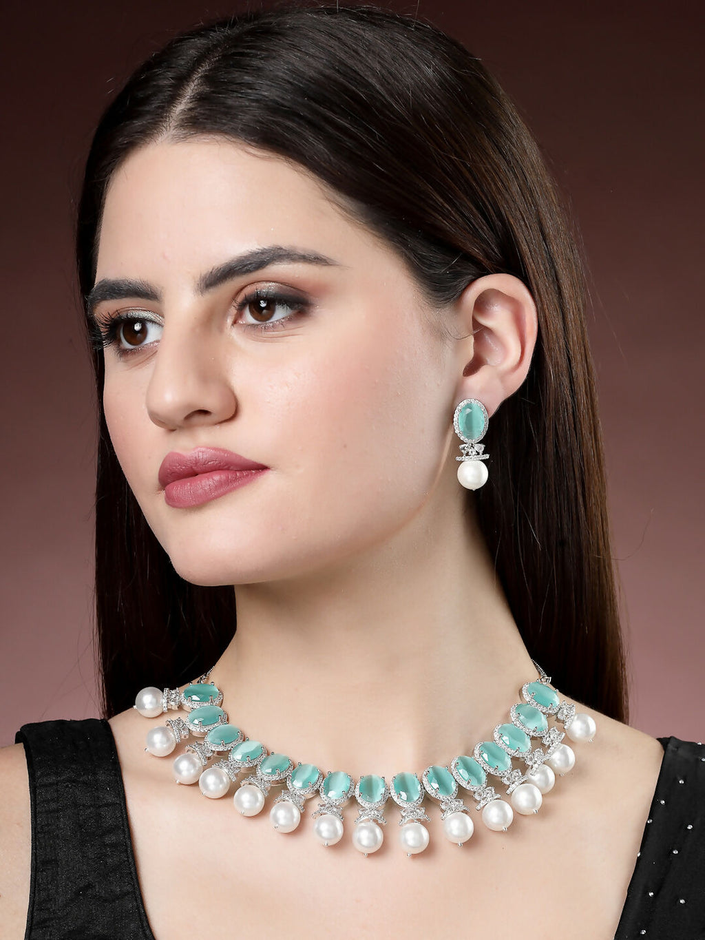 NVR Women's Silver-Plated Green American Diamond Studded Handcrafted Jewellery Set
