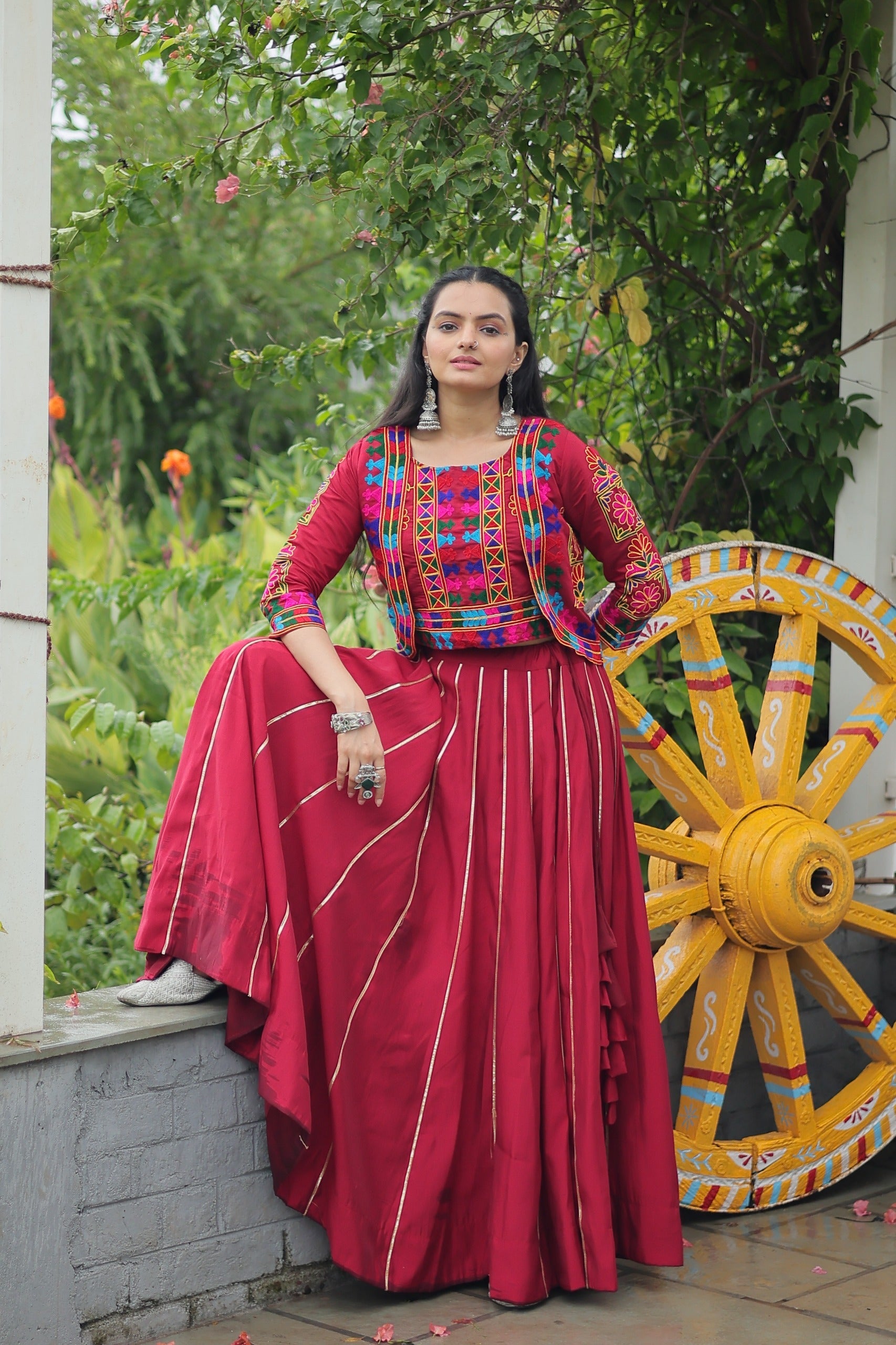 Evanik Navratri Maroon Roamn Fabric With Kutchi Work Koti Style Blouse Stitched Lehenga Choli