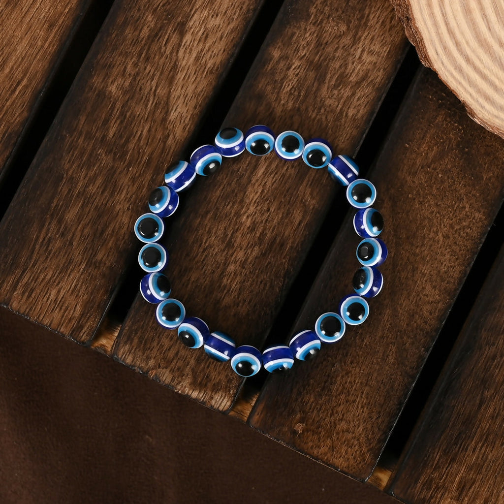 NVR Women & Men Blue Evil Eye Rakhi With Roli Chawal - Distacart
