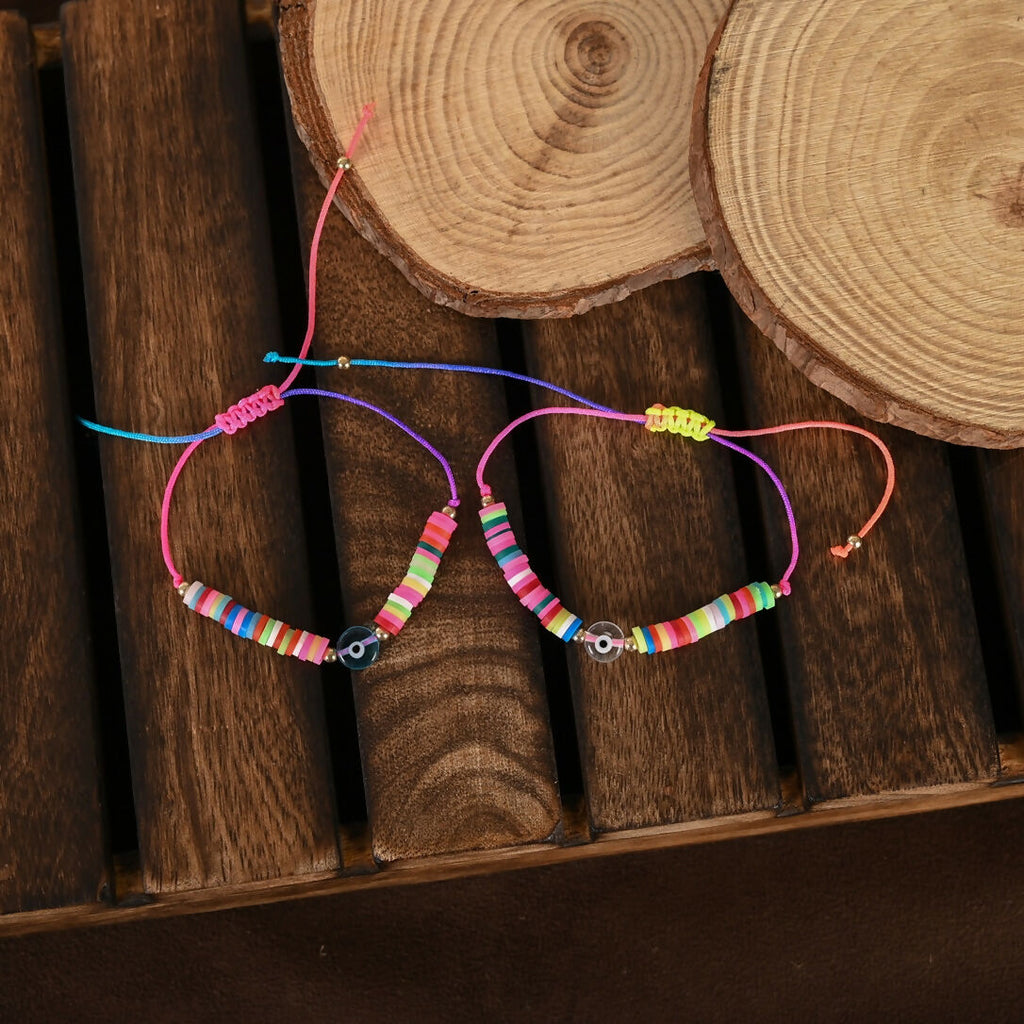 NVR Women & Men Set of 2 Multicolor Evil Eye Rakhi With Roli Chawal - Distacart