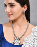 VOJ Silver Plated Oxidized Kanha Shape Long Necklace with Earring Set
