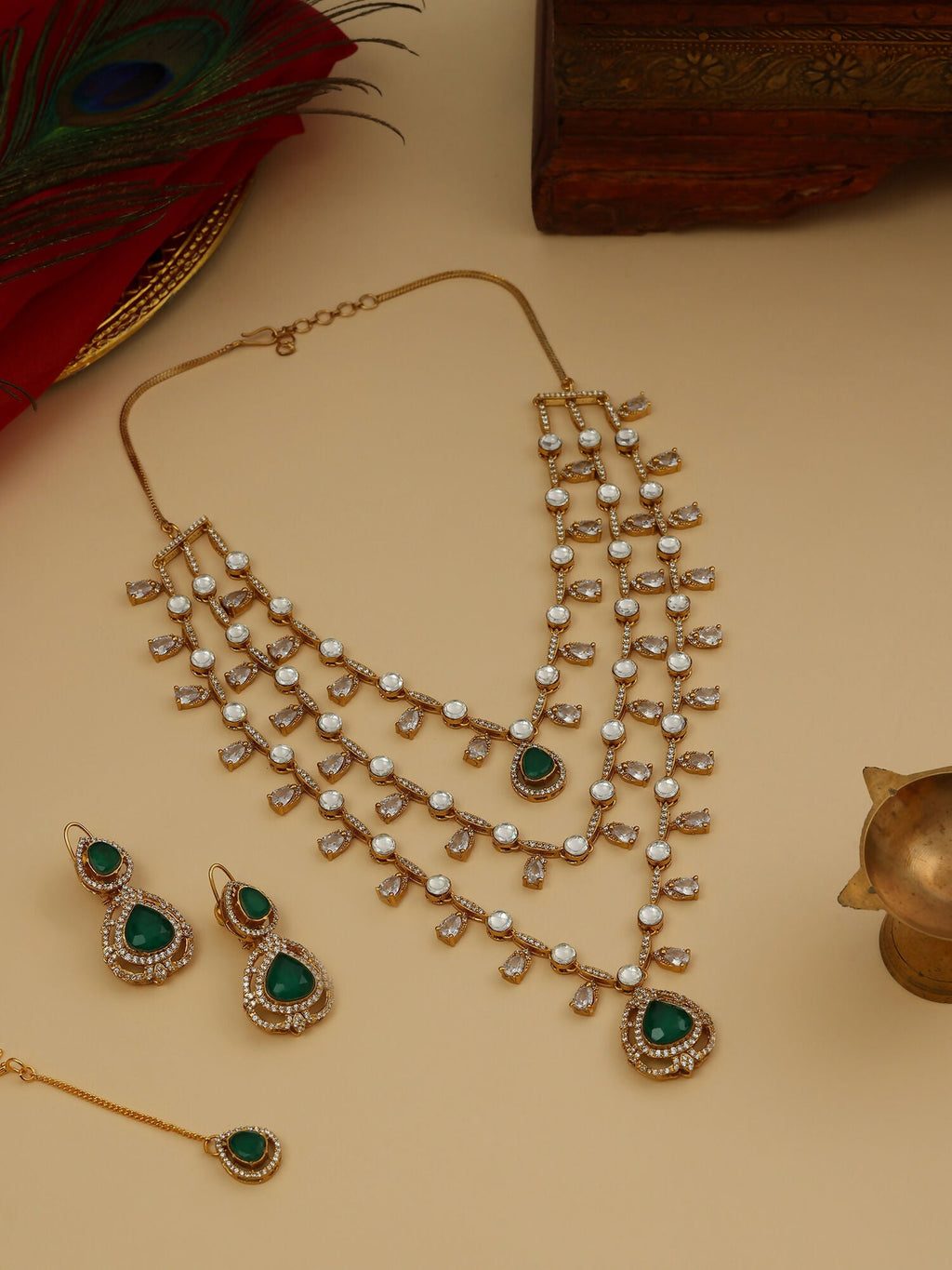 Ruby Raang 22k Gold Polished Layered Kundan And Emerald Necklace With Earrings And Maang Tikka