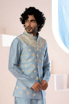 A Powder Blue Floral Hand Embroidered Nehru Jacket by Hilo Design