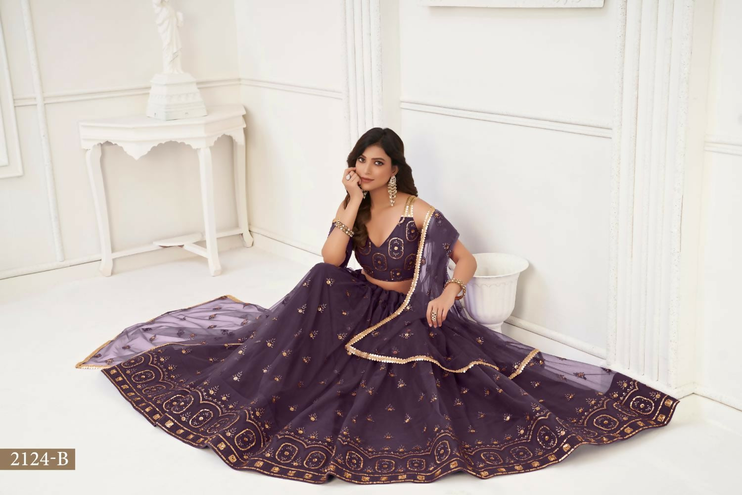 Aastha Fashion Dusty Wine Butterfly Net Tone To Tone Thread Work And Sandwich Sequence Work Embroidery Wedding Wear Lehenga Choli