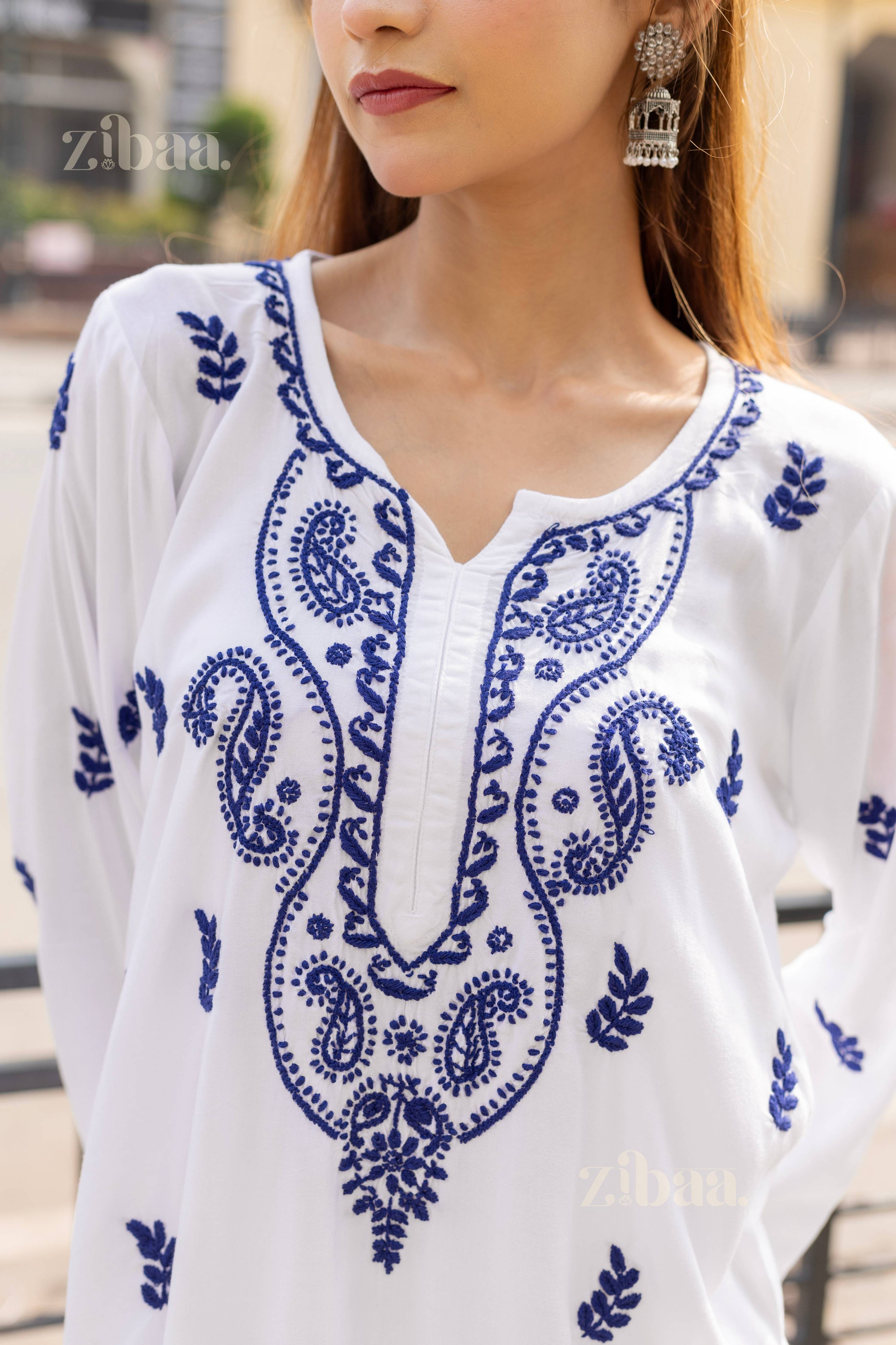 Zibaa Rayon White Chikankari Kurti with small motifs - Distacart