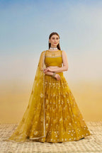 Aastha Fashion Mustard Yellow Butterfly Net Tone To Tone Cotton Thread Work And Sequence Work Embroidery Wedding Wear Lehenga Choli
