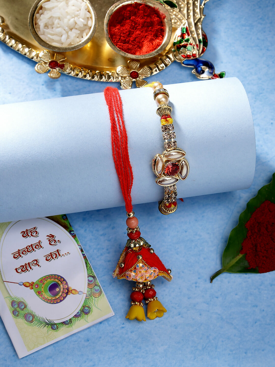 NVR Women & Men Set of 2 Red & Gold-Toned Stone-Studded Bhaiya Bhabhi Rakhi With Roli Chawal - Distacart