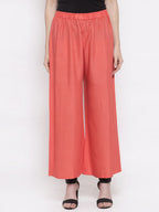TAG 7 Women Peach-Coloured Solid Flared Palazzos