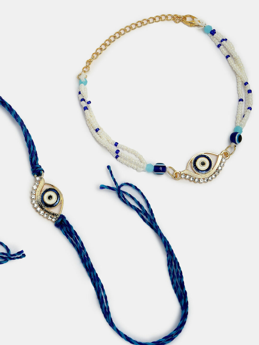 NVR Women & Men Set of 2 Blue Evil Eye Bhaiya Bhabhi Rakhi Set With Roli Chawal - Distacart