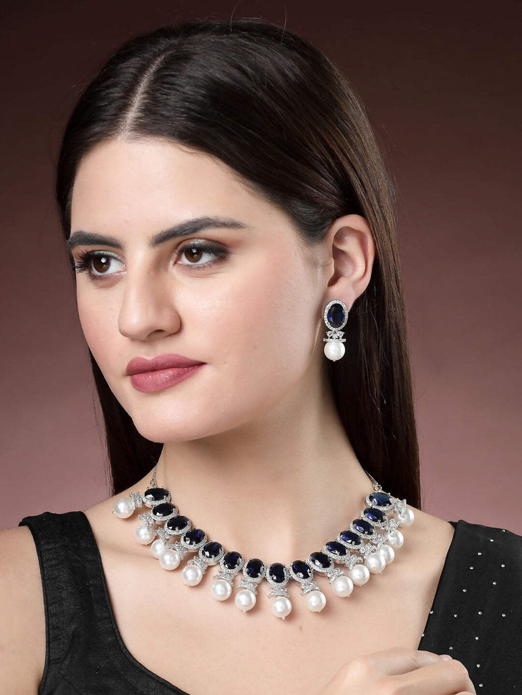 NVR Women's Silver-Plated Blue American Diamond Studded Handcrafted Jewellery Set