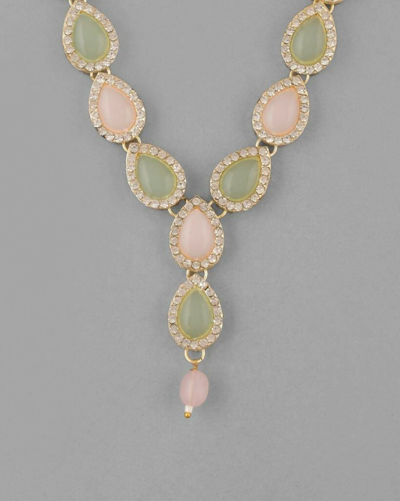 VOJ Gold-Polished Nude Pink And Mint Green Stone Studded Jewellery Set With Maang Tikka