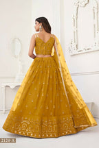 Aastha Fashion Mustard Yellow Butterfly Net Tone To Tone Thread Work And Sandwich Sequence Work Embroidery Wedding Wear Lehenga Choli