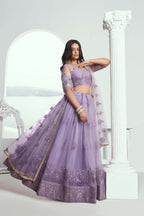 Aastha Fashion Lavender Butterfly Net Tone To Tone Cotton Thread Work And Sequence Work Embroidery Wedding Wear Lehenga Choli