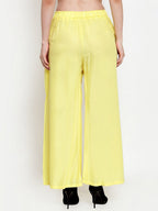 TAG 7 Women Yellow Solid Flared Ethnic Palazzos