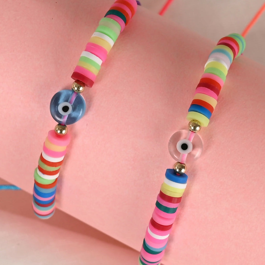 NVR Women & Men Set of 2 Multicolor Evil Eye Rakhi With Roli Chawal - Distacart