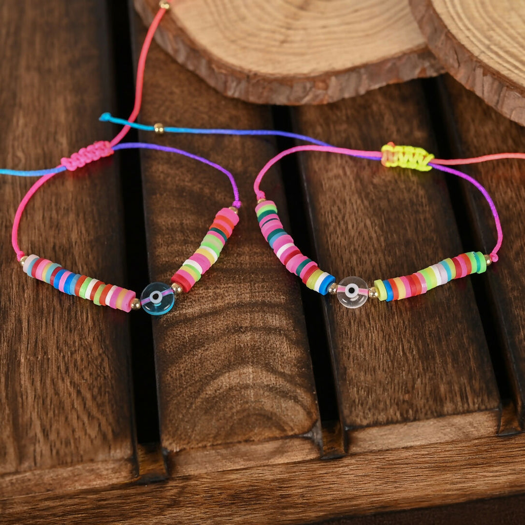 NVR Women & Men Set of 2 Multicolor Evil Eye Rakhi With Roli Chawal - Distacart