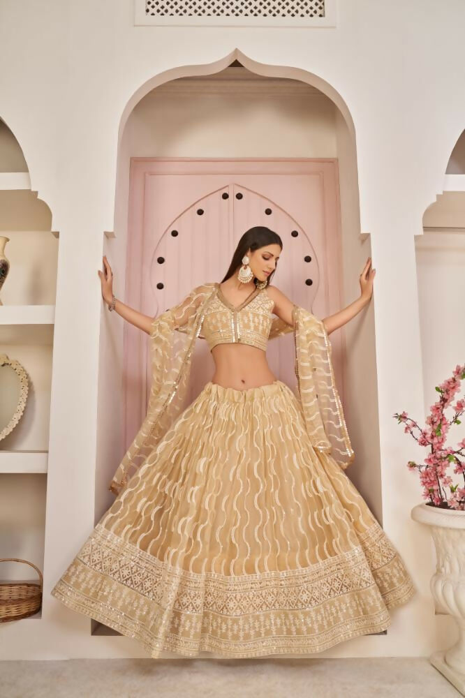 Aastha Fashion Beige Chiku Butterfly Net White Cotton Thread Work, Zari Work And Sandwich Sequence Work Embroidery Wedding Wear Lehenga Choli