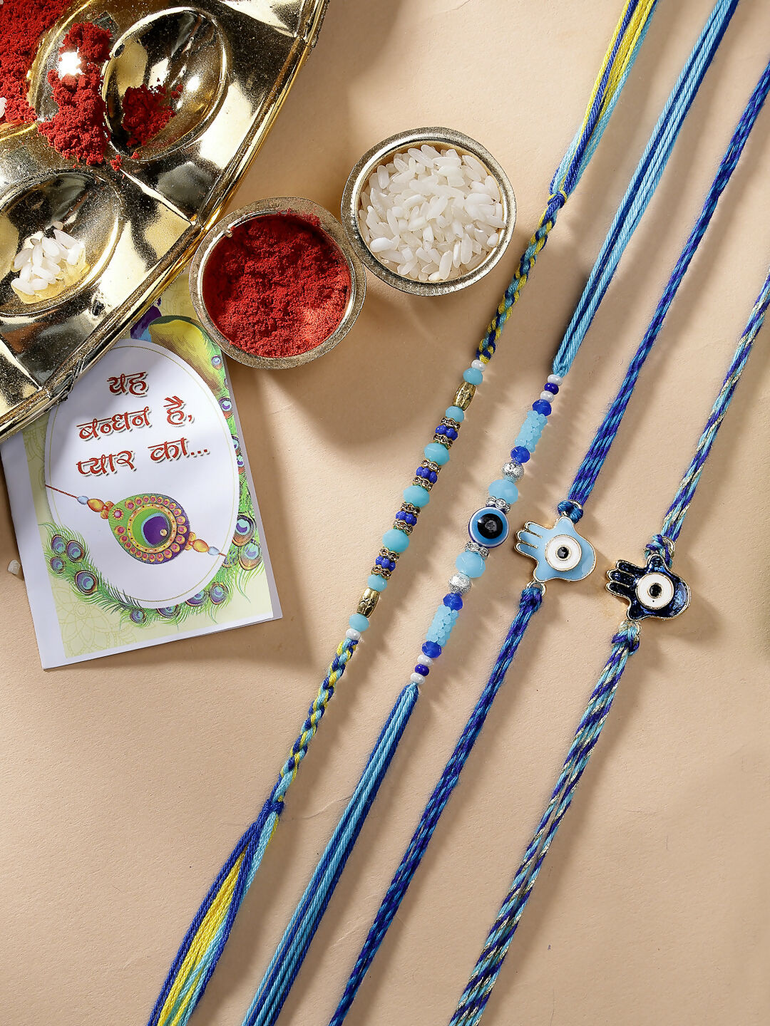 NVR Women & Men Set of 4 Blue Evil Eye Charm Rakhi With Roli Chawal & Chocolate - Distacart
