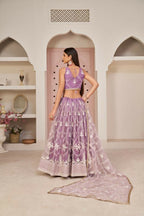 Aastha Fashion Lavender Butterfly Net White Cotton Thread Work, Zari Work And Sandwich Sequence Work Embroidery Wedding Wear Lehenga Choli