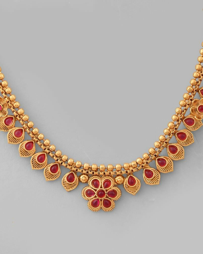 VOJ Gold-Polished Flower Shaped Ruby Stone Studded Jewellery Set