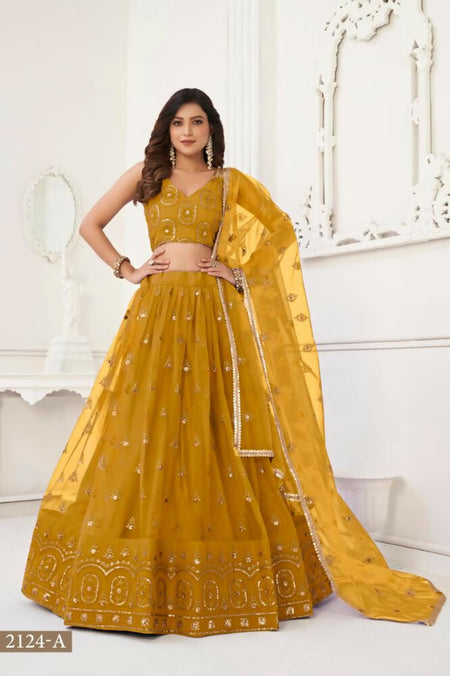 Aastha Fashion Mustard Yellow Butterfly Net Tone To Tone Thread Work And Sandwich Sequence Work Embroidery Wedding Wear Lehenga Choli
