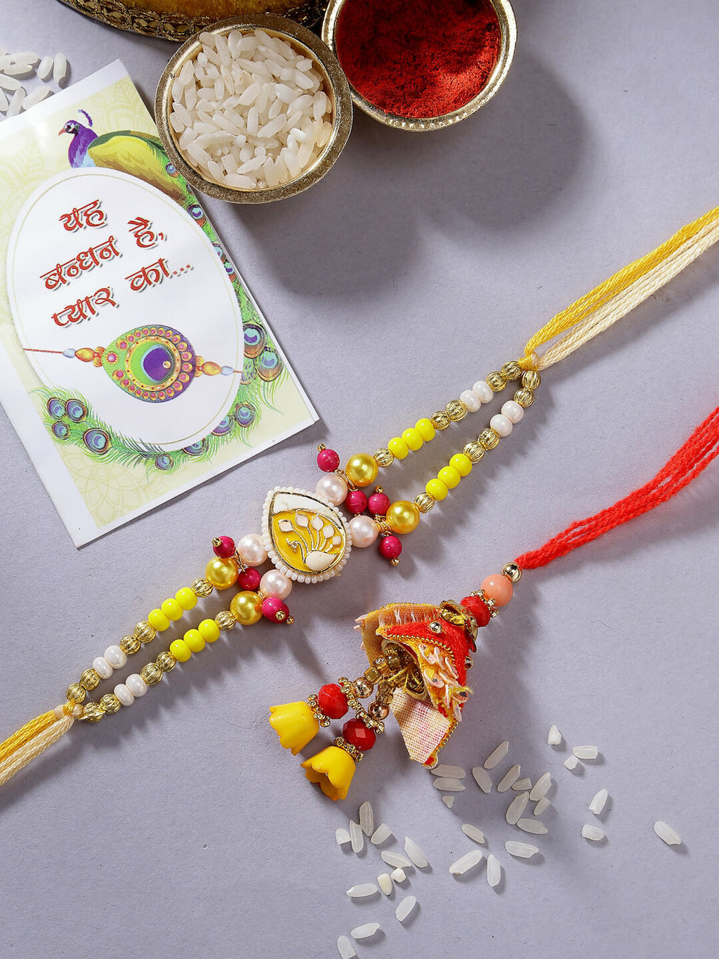 NVR Women & Men Set of 2 Yellow Peacock Design Bhaiya Bhabhi Rakhi With Roli Chawal - Distacart