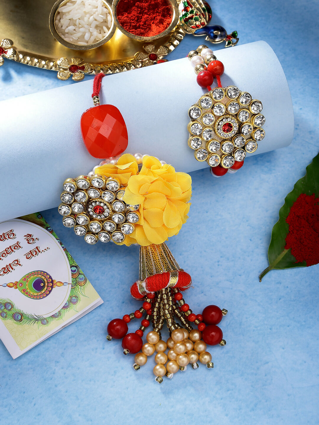 NVR Women & Men Set of 2 Red & Gold-Toned Stone-Studded & Beaded Bhaiya Bhabhi Rakhi With Roli Chawal - Distacart