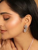 Nuyug Rhodium-Plated Rhinestone Studded Floral Minimal Cotemporary Studs - Distacart