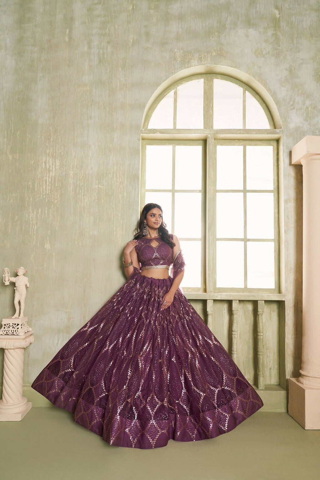 Eilara Embroidered, Sequins And Thread Work Net A - Line Lehenga Choli In Wine