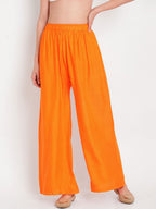 TAG 7 Women Orange Solid Flared Palazzos
