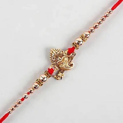 Auspicious Ganesha Rakhi And Kaju Rolls Box - Distacart