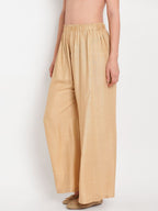 TAG 7 Women Beige Solid Flared Palazzos
