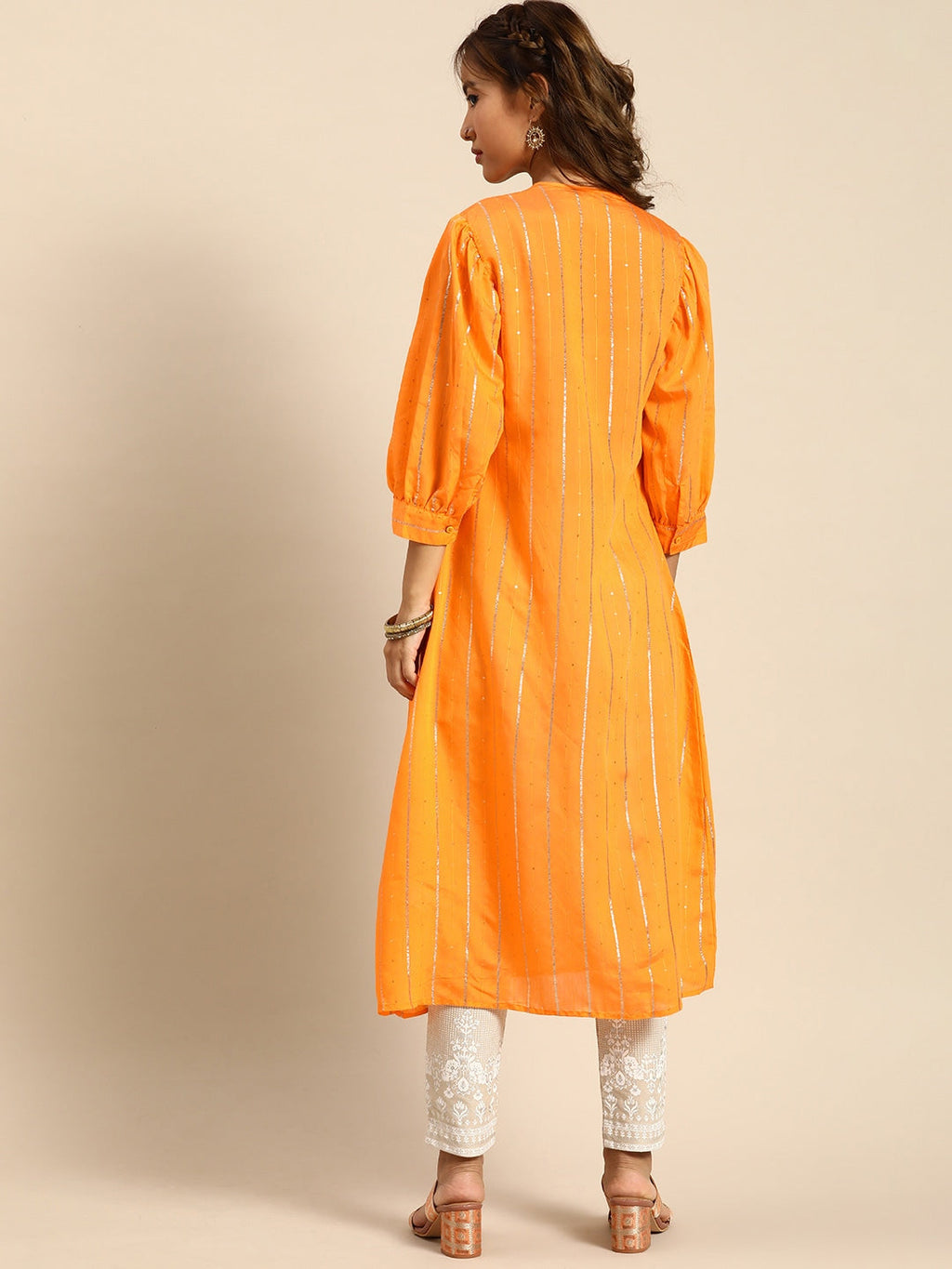 Sangria Women Jacquard Chanderi Silk Tie-Up Neck Puff Sleeves Kurta With Sequin Detail