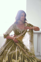 Eilara Adorable Olive Green Sequins Net Mehendi Wear Lehenga Choli